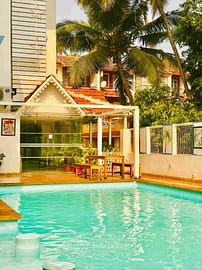 beautiful hotel with pool_9_11zon Dahanu Beach resort pool area